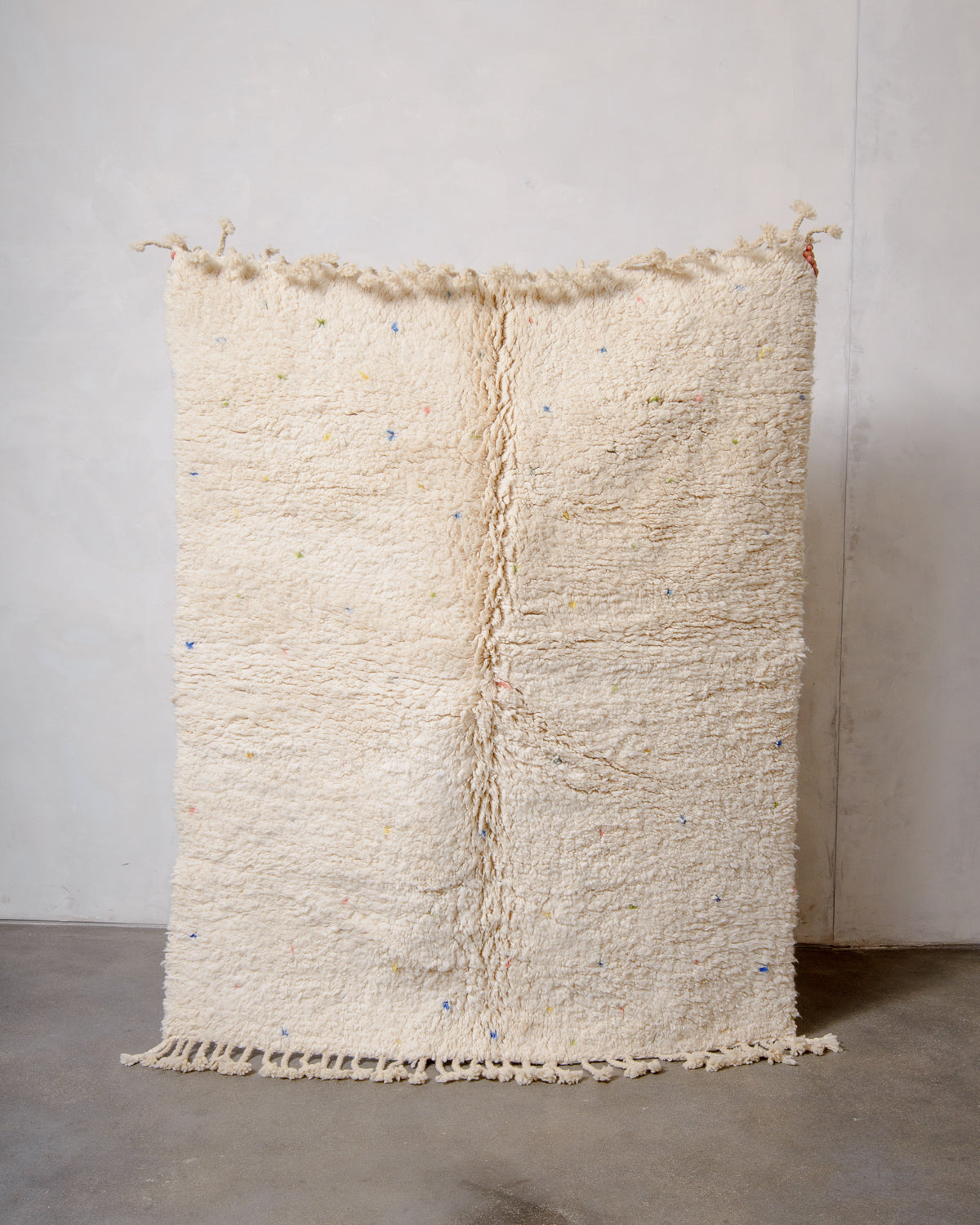 Modern, designer, handcrafted Berber rug from Morocco. Beniourain carpet with beautiful colours and patterns and fluffy wool texture.